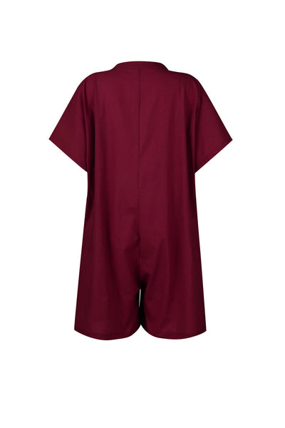 Anna - Loose-fitting jumpsuit with pockets and button closure
