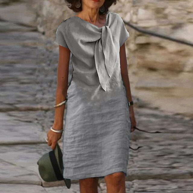 Casual and elegant midi dress with bow design
