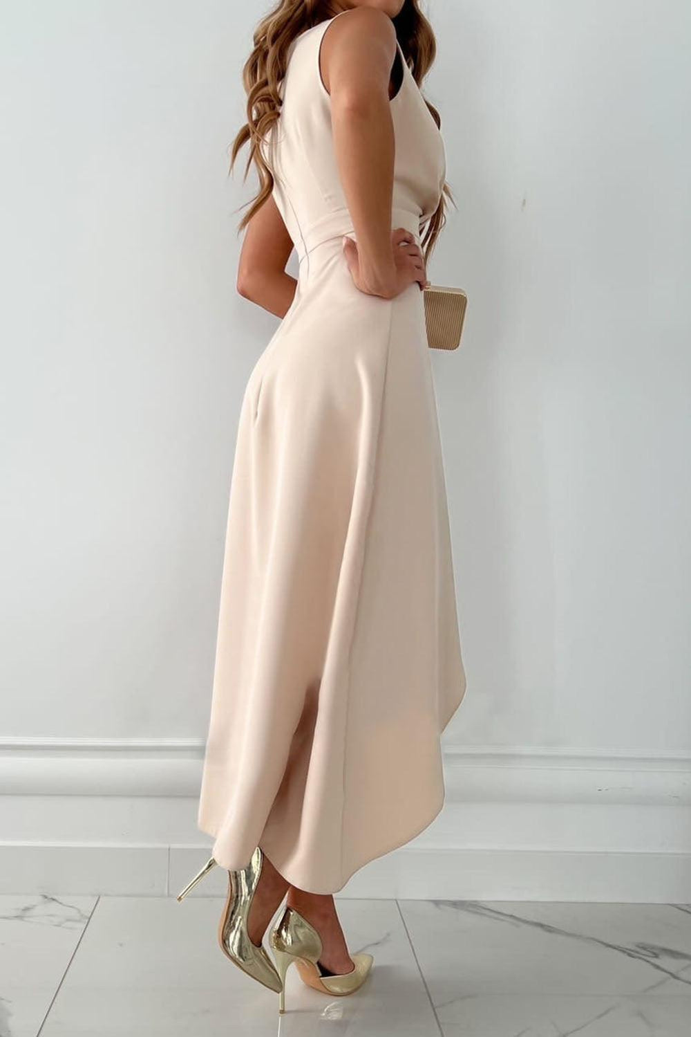 Sleeveless midi wrap dress with asymmetric cut and V-neckline