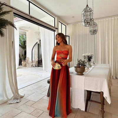 Elegant long party dress with a flowing cut and strapless gradient effect
