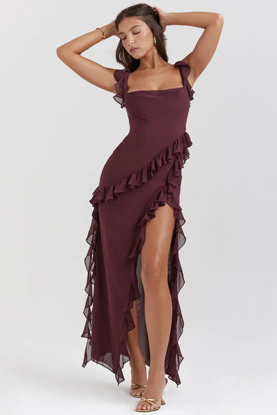 Long summer dress with a high neck and elegant details, ideal for special occasions