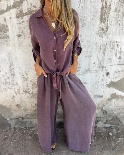 Light summer outfit with a long-sleeved button-down shirt and wide-legged pants