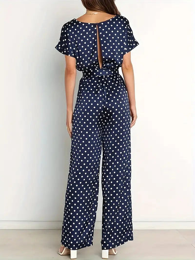 Women's long jumpsuit with elegant design and polka dot print