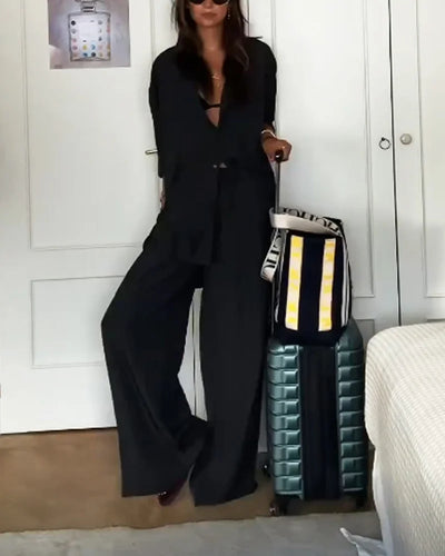 Modern two-piece set for women with solid-colored shirt and pants