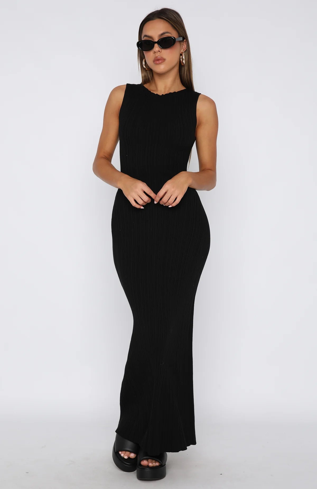 Sleeveless fitted long dress in a minimalist style