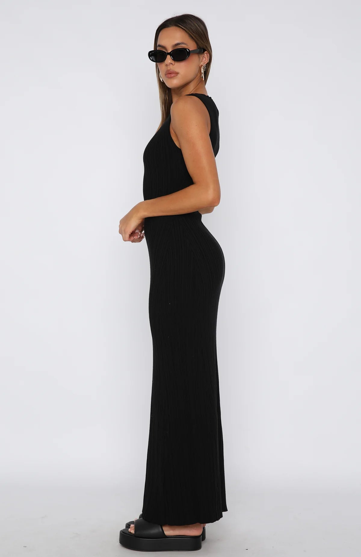 Sleeveless fitted long dress in a minimalist style