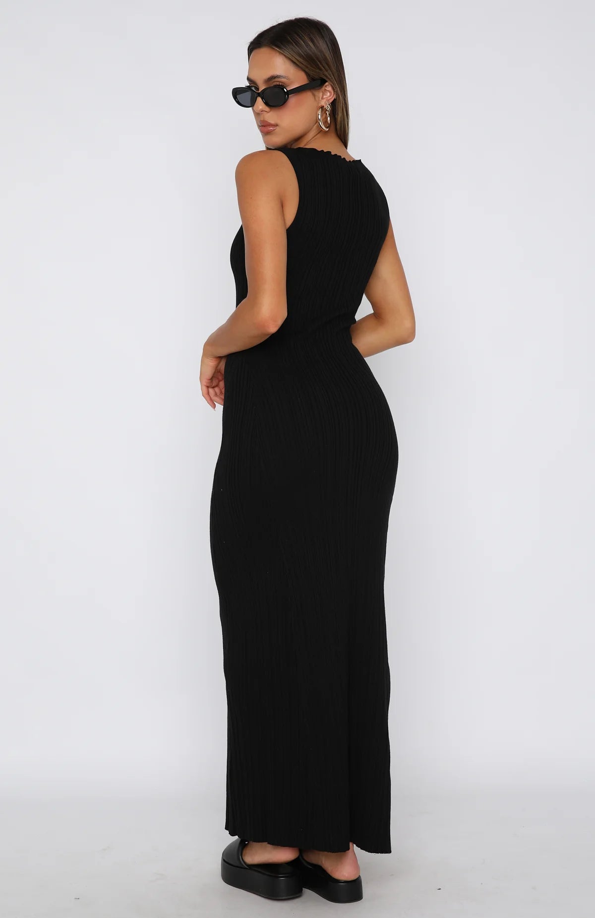 Sleeveless fitted long dress in a minimalist style