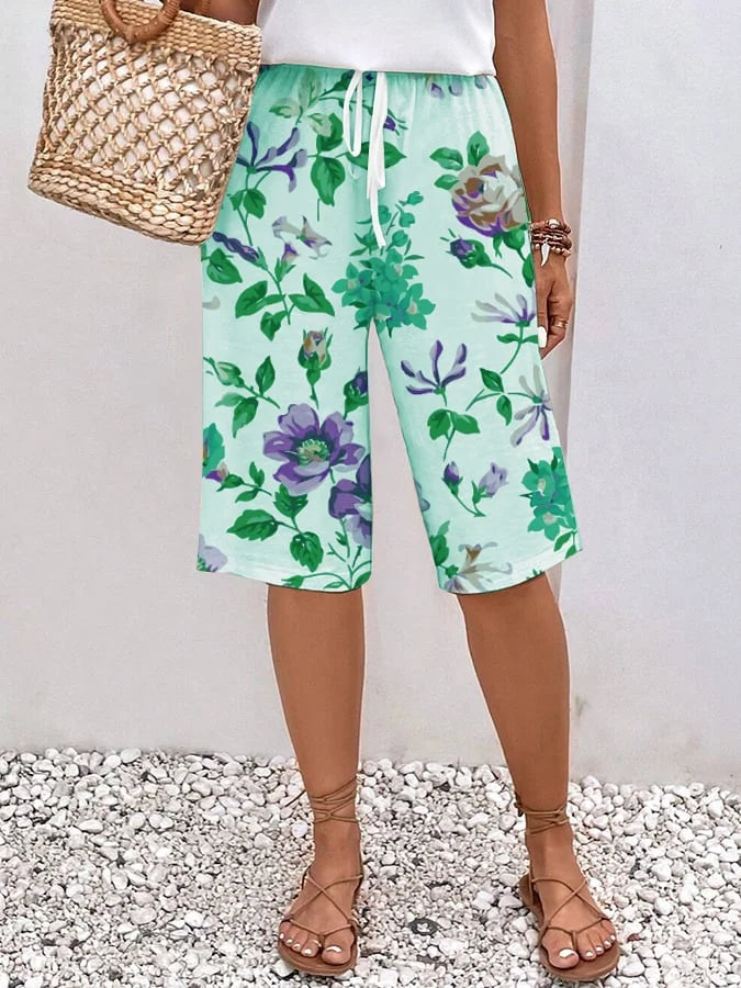 Emma - Women's relaxed, loose-fitting trousers with drawstrings in a floral and botanical print