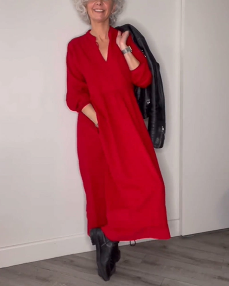 Elegant long dress with a V-neckline and long sleeves