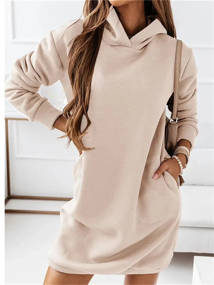 Dolly - Cozy hooded dress with pockets for a casual look.