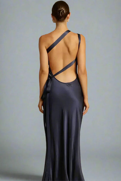 Elegant one-shoulder long dress with open back and asymmetrical neckline, ideal for special events