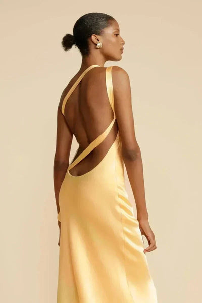 Elegant one-shoulder long dress with open back and asymmetrical neckline, ideal for special events