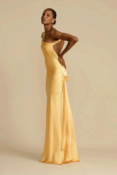 Elegant one-shoulder long dress with open back and asymmetrical neckline, ideal for special events