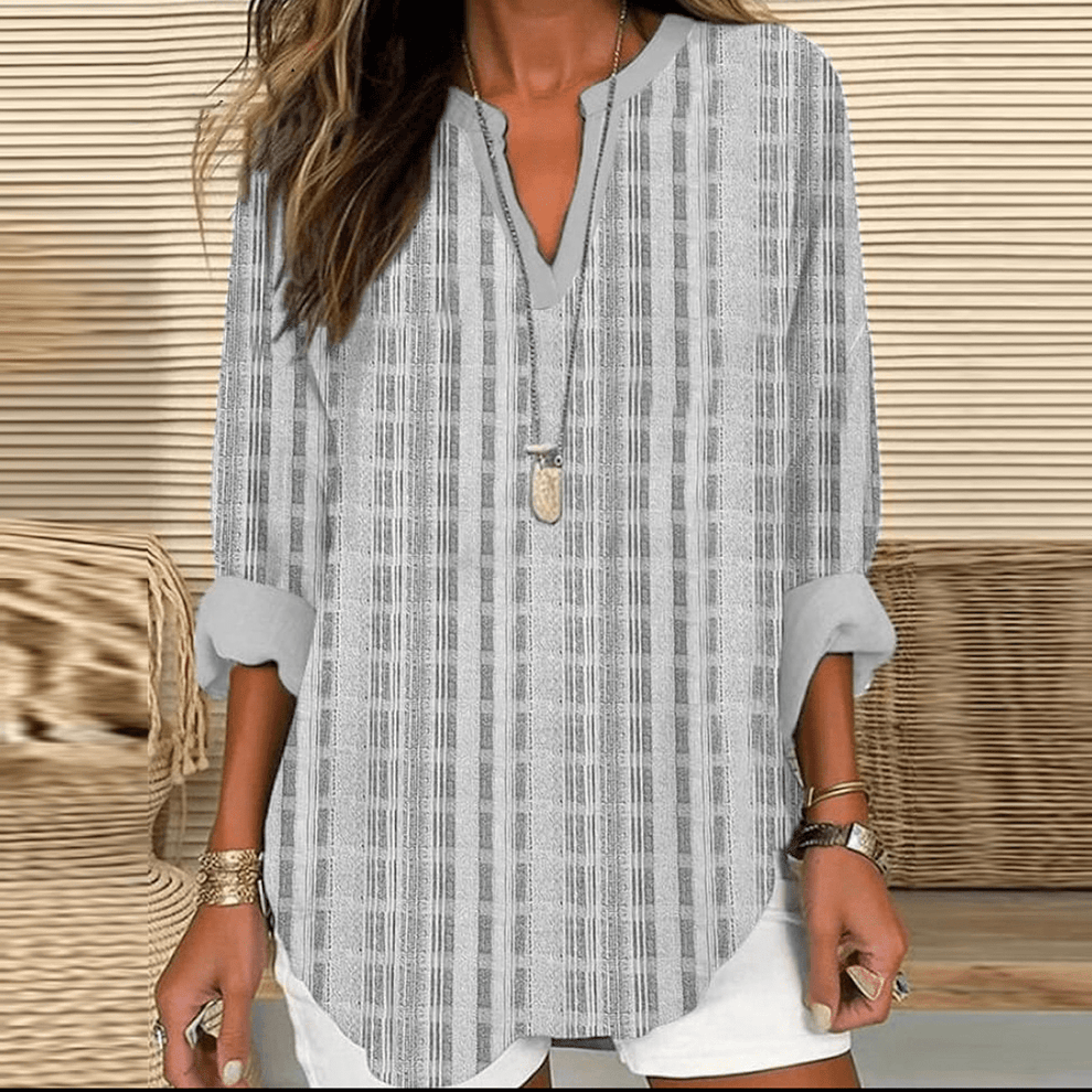 Women's long blouse with a V-neckline and long sleeves
