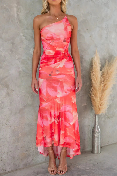 Light and elegant midi dress with floral print and asymmetric design