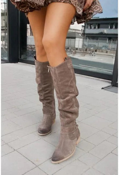 Comfortable and elegant boots with a zipper and small heel