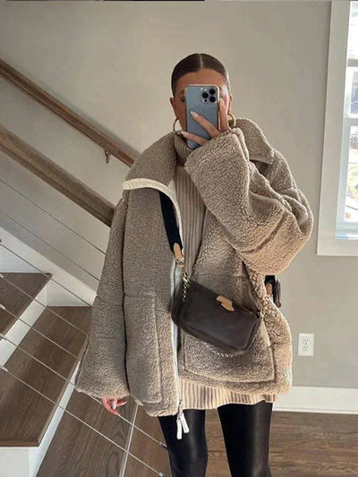 Cozy jacket with high collar and pockets
