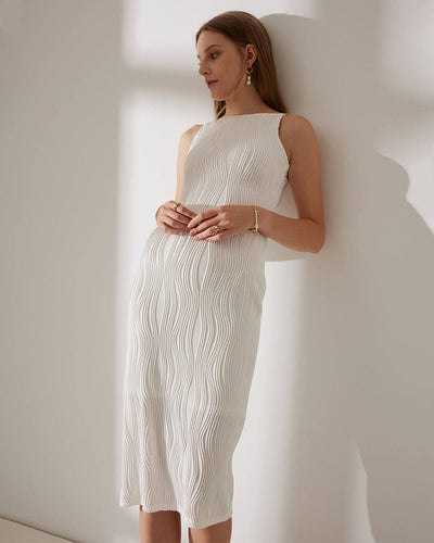 Sleeveless midi dress with delicate straps and refined style