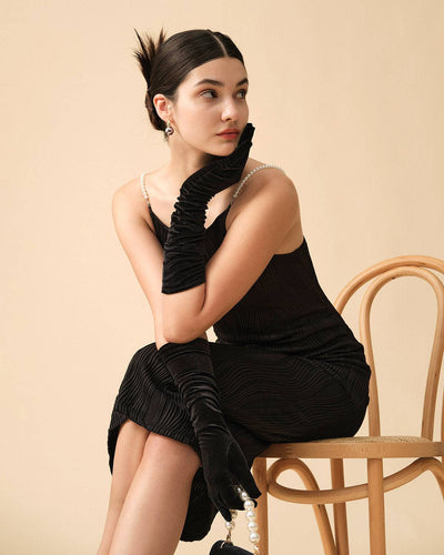 Sleeveless midi dress with delicate straps and refined style