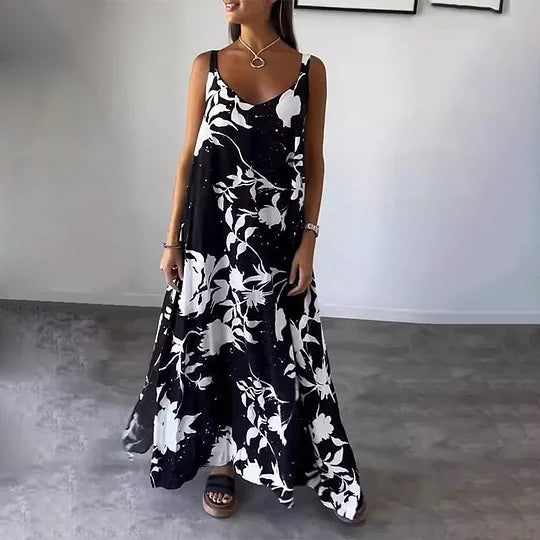 Long sleeveless dress with floral print, ideal for sunny days