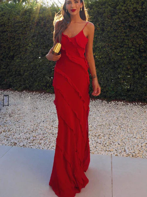 Elegant long dress with ruffles and thin straps, ideal for special occasions