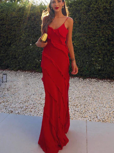 Elegant long dress with ruffles and thin straps, ideal for special occasions