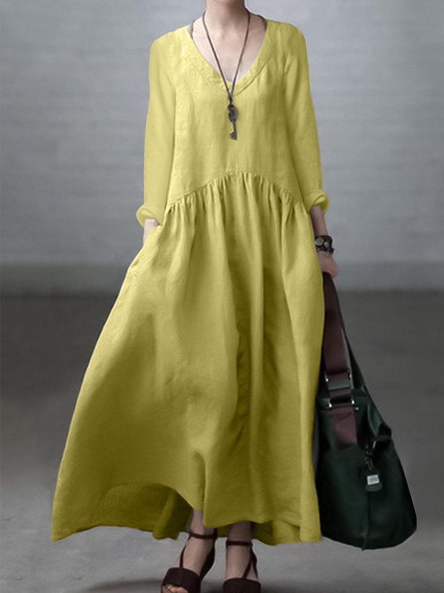 Loose, lightweight dress with a V-neckline and long sleeves