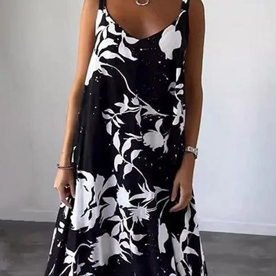 Long sleeveless dress with floral print, ideal for sunny days