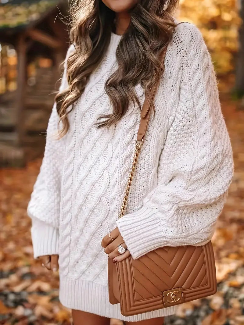 Warm and elegant sweater dress with braided design