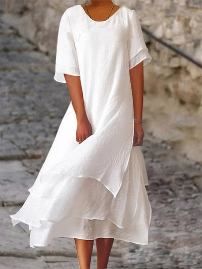 Long lightweight dress with short sleeves and layered skirt
