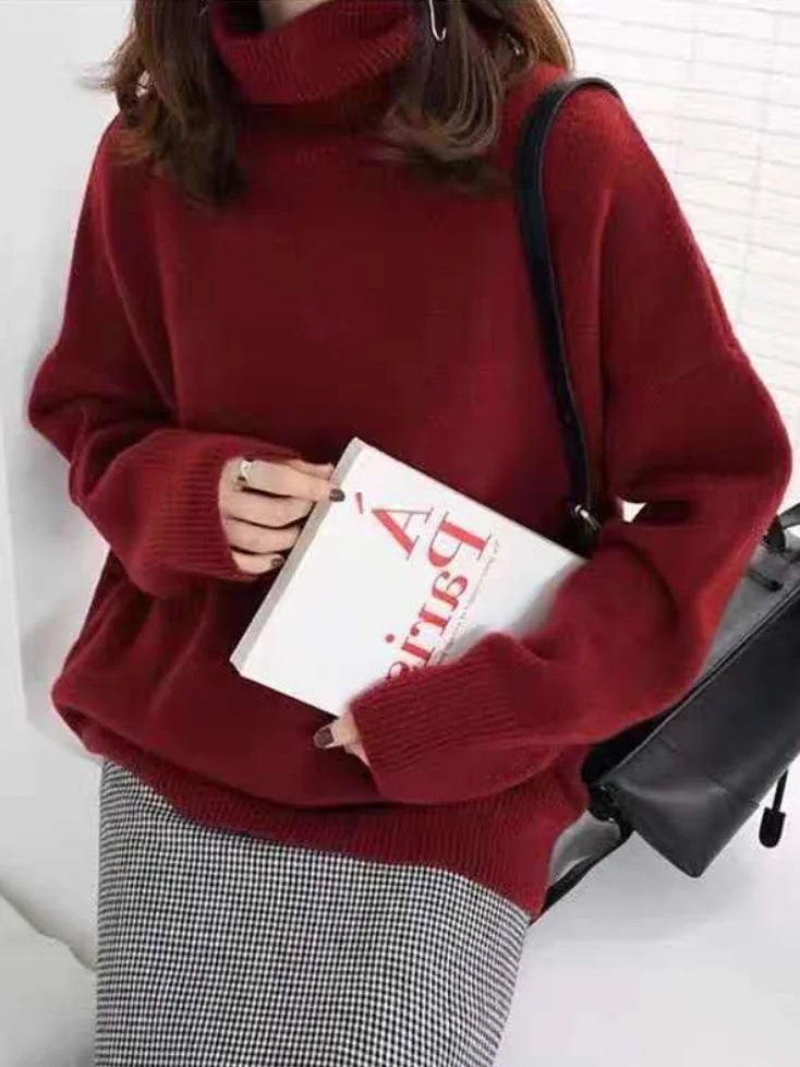 Elegant oversized sweater with long sleeves and a high neck