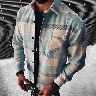 Men's plaid shirt with elegant design and button closure, ideal for a modern style