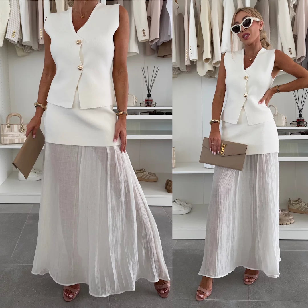Elegant women's set with a long pleated skirt and a buttoned vest