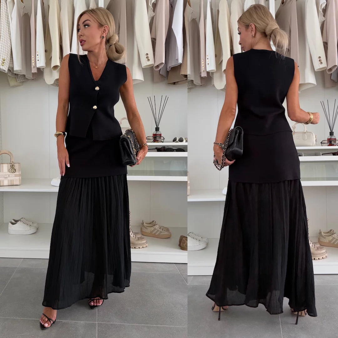 Elegant women's set with a long pleated skirt and a buttoned vest