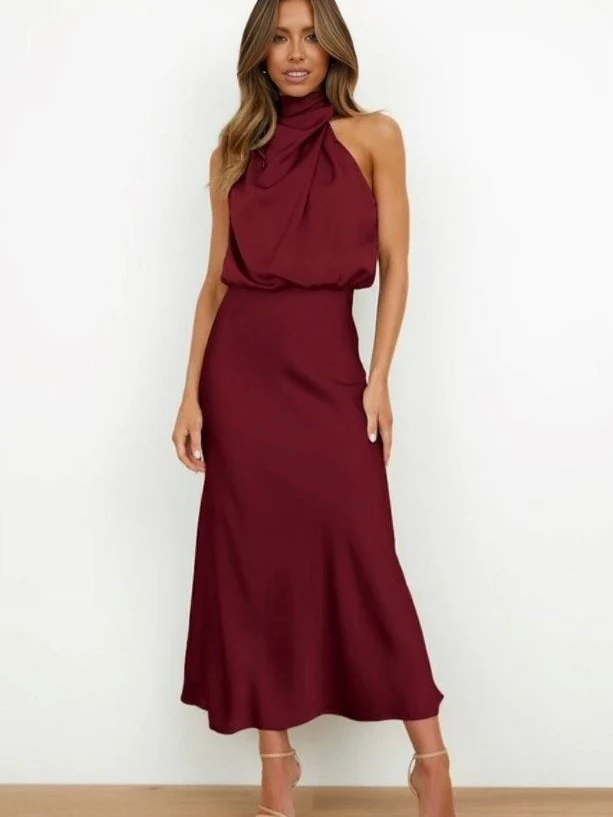 Long sleeveless dress with asymmetrical neckline and refined style