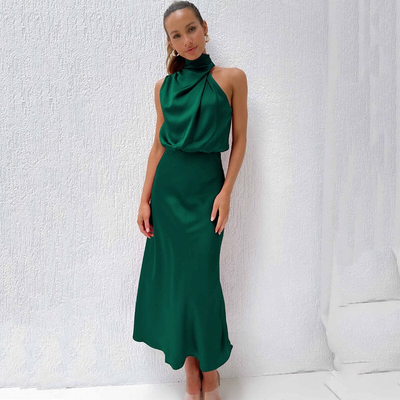 Long sleeveless dress with asymmetrical neckline and refined style