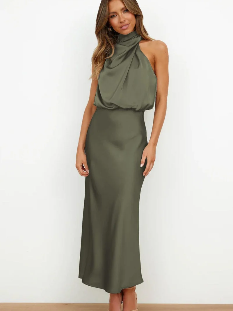 Long sleeveless dress with asymmetrical neckline and refined style