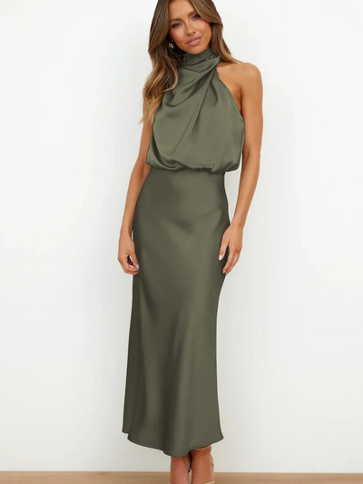 Long sleeveless dress with asymmetrical neckline and refined style