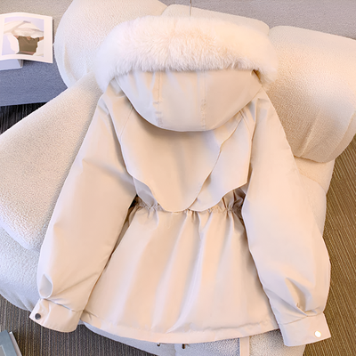 Elegant winter coat with deep hood for stylish women