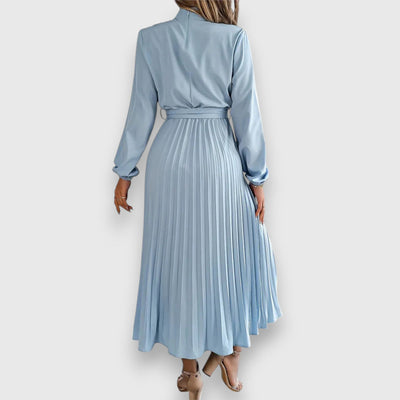 Casual midi dress with pleated skirt, belt, and long sleeves
