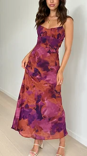 Long printed dress with thin straps and open back