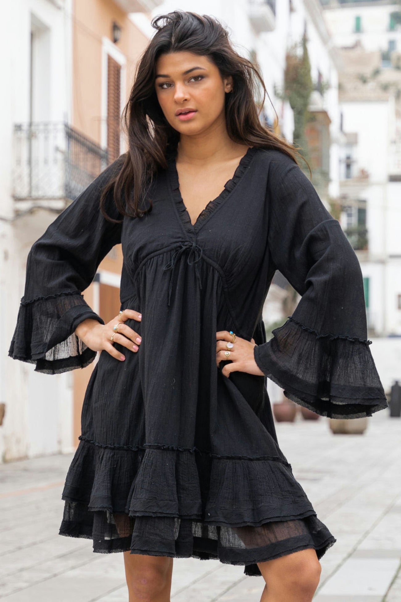 Elegant mini dress with ruffles and long sleeves