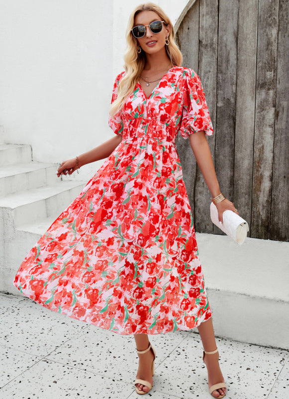 Elegant long dress with a V-neckline and subtle print