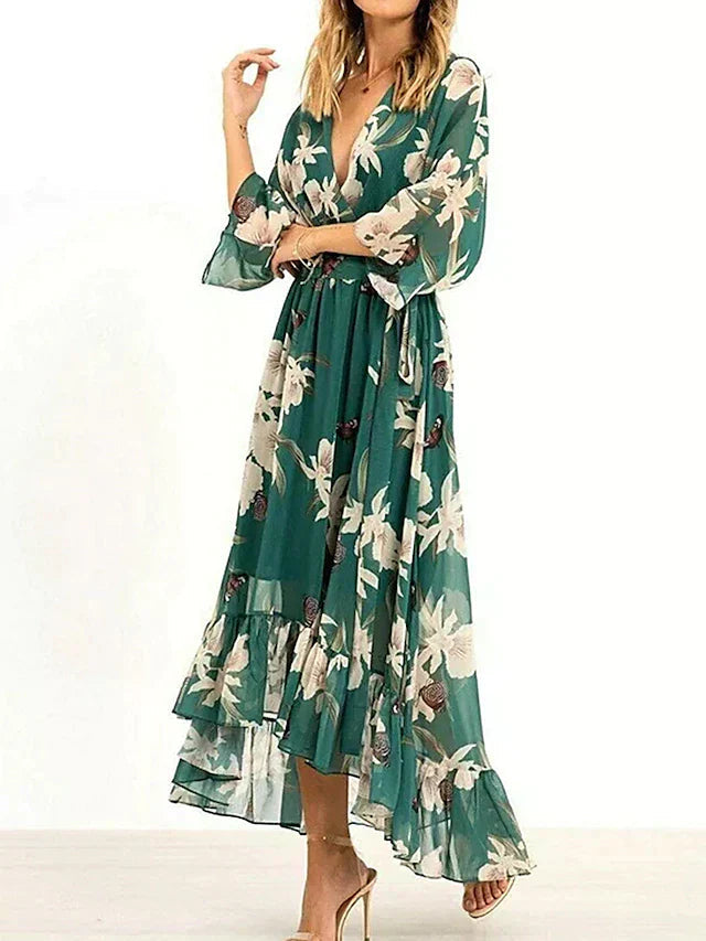Long summer dress with elegant design, flowing skirt and plunging neckline, perfect for any occasion
