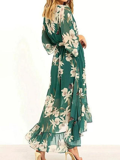 Long summer dress with elegant design, flowing skirt and plunging neckline, perfect for any occasion