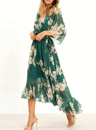 Long summer dress with elegant design, flowing skirt and plunging neckline, perfect for any occasion