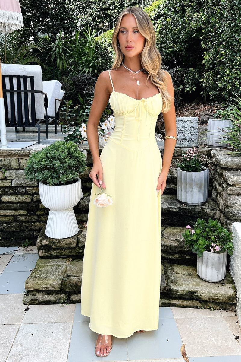 Elegant midi dress with thin straps, ideal for events