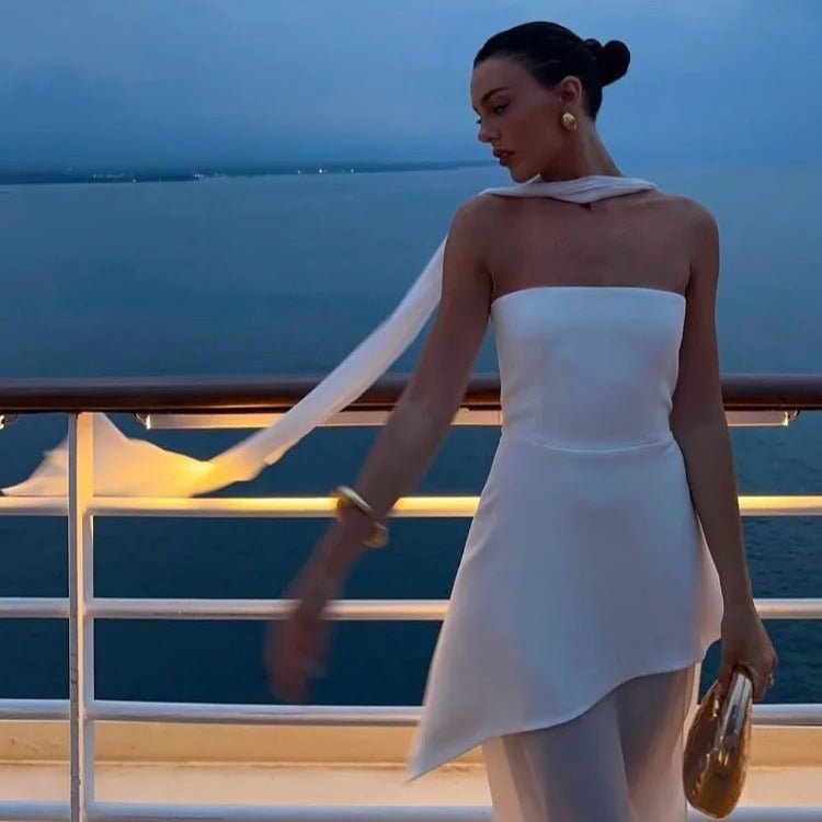 Elegant long dress with open back and scarf collar