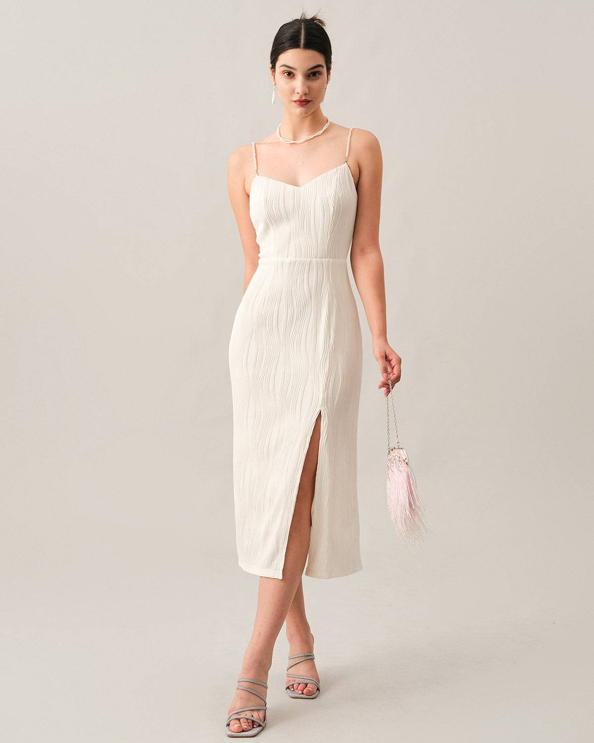 Elegant midi dress with thin straps and delicate texture
