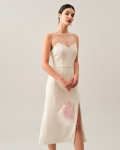 Elegant midi dress with thin straps and delicate texture
